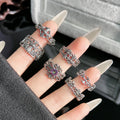 Chrome Hearts distressed iris cross open adjustable ring